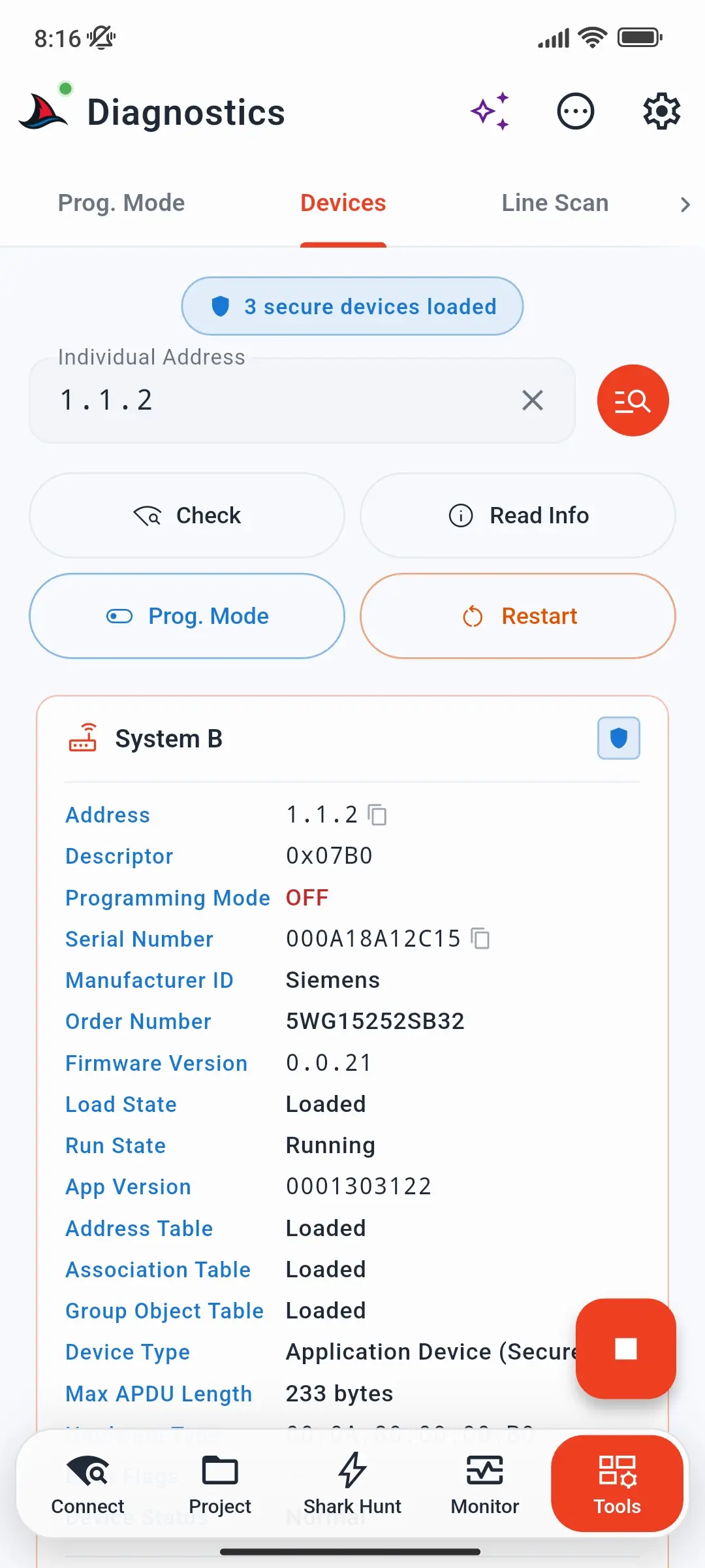 Devices tab with address 1.1.2, the Check, Read Info, Prog. Mode, and Restart buttons, and the device info card of a secure System B device